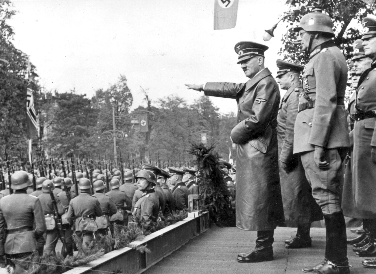 Adolf Hitler salutes the Wehrmacht parade in Warsaw following the defeat of Poland